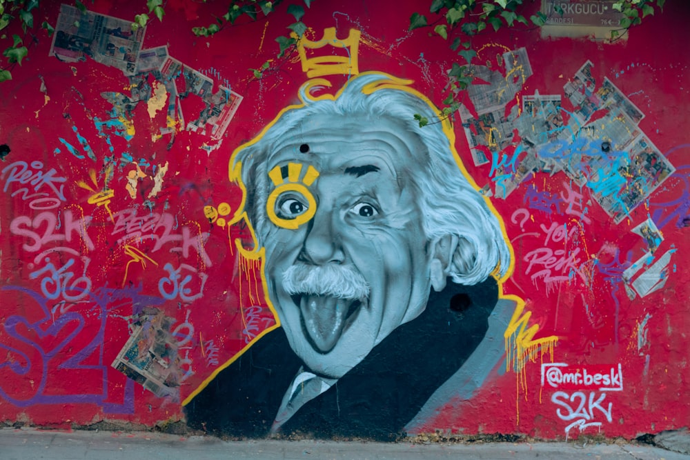 Istanbul, Turkey - December 17, 2018: Albert Einstein showing the tongue artwork on the wall